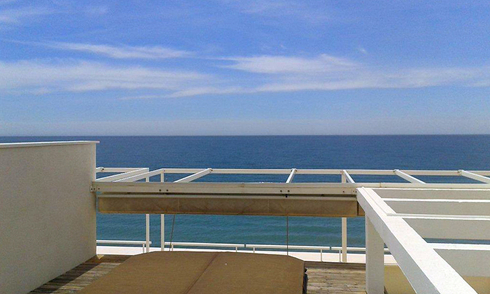 Large double penthouse for sale, frontline beach, between Marbella and Estepona 