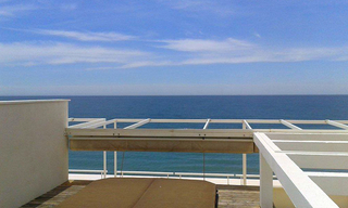 Large double penthouse for sale, frontline beach, between Marbella and Estepona 0