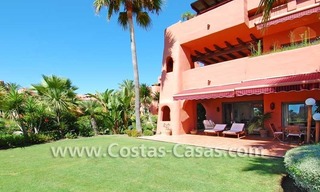 Luxury first line beach ground floor apartment for sale in a frontline beach complex on the New Golden Mile in the area between Marbella and Estepona 4