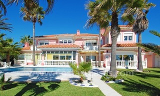 First line beach villa with 2 guest houses for sale in East Marbella 4