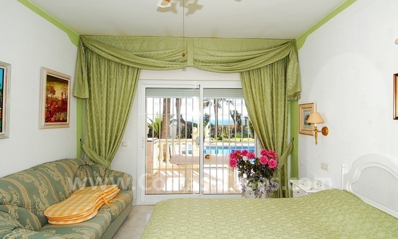 First line beach villa with 2 guest houses for sale in East Marbella 16