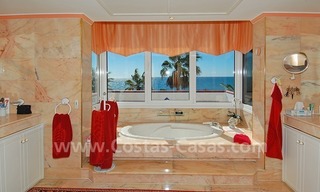First line beach villa with 2 guest houses for sale in East Marbella 19