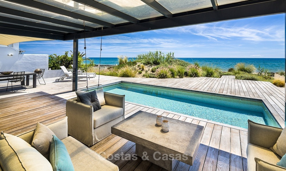 Modern beachfront villa for sale in Marbella with breathtaking sea views 1199