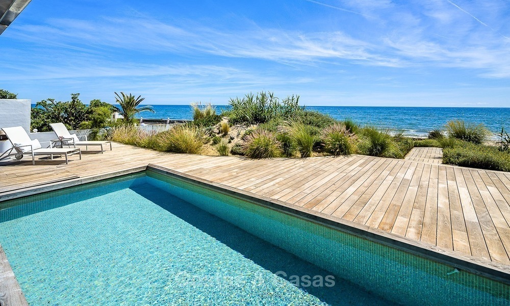 Modern beachfront villa for sale in Marbella with breathtaking sea views 1202