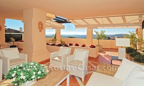 Large luxury elevated ground-floor apartment for sale in Nueva Andalucía – Marbella 
