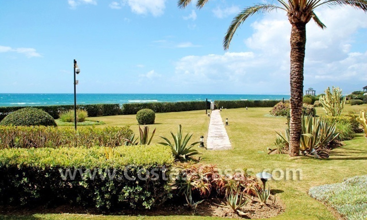 Beachfront andalusian style luxury apartment for sale in Marbella 0