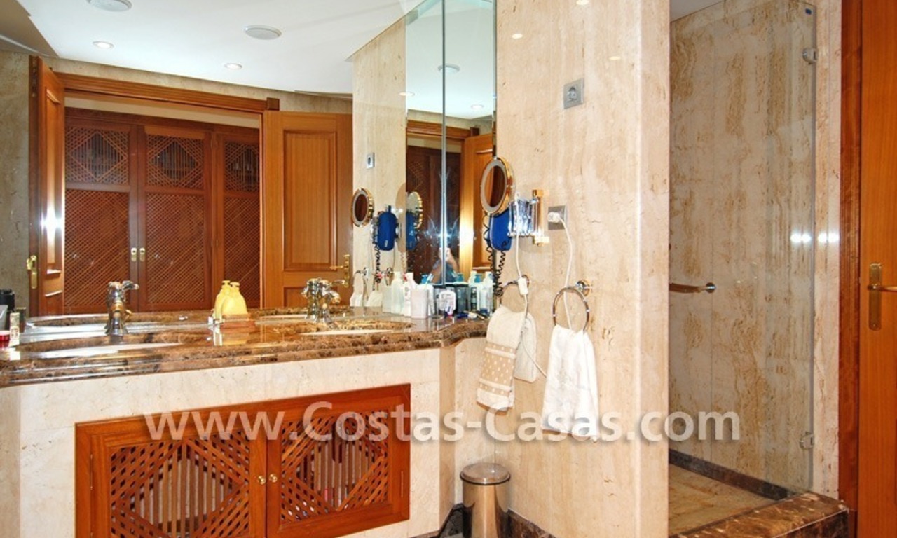 Beachfront andalusian style luxury apartment for sale in Marbella 13