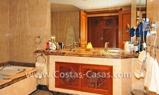 Beachfront andalusian style luxury apartment for sale in Marbella 14