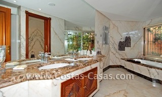 Beachfront andalusian style luxury apartment for sale in Marbella 16