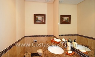 Beachfront andalusian style luxury apartment for sale in Marbella 20