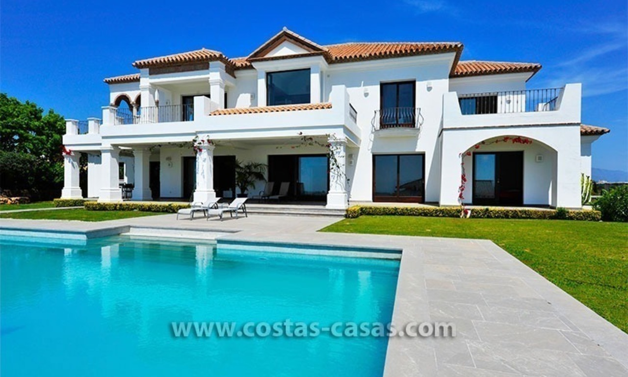 Contemporary Andalusian style luxury villa for sale at Golf Resort between Marbella and Estepona 1