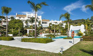 Contemporary Mediterranean style apartments for sale with their own private lagoon on the Costa del Sol 20058 