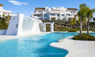 Contemporary Mediterranean style apartments for sale with their own private lagoon on the Costa del Sol 20066 