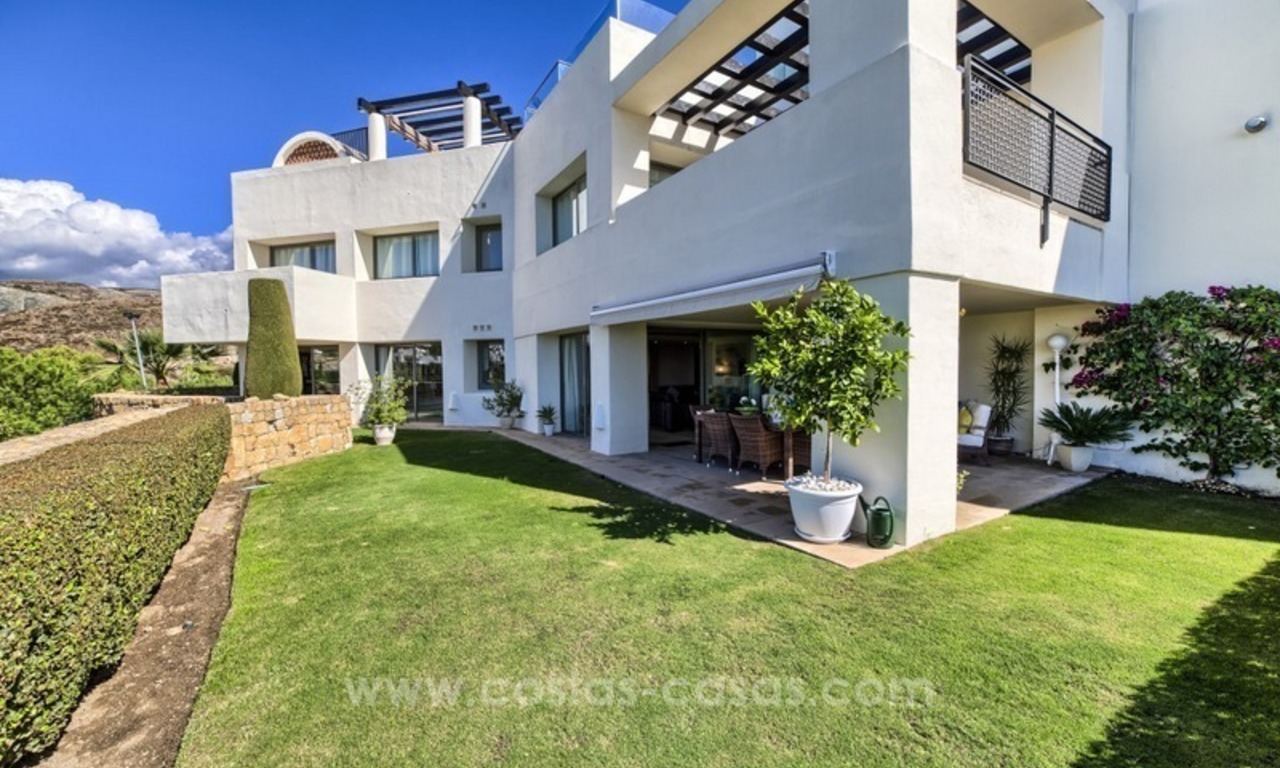 Modern luxury frontline golf ground floor apartment in a 5-star golf resort for sale in Benahavis - Marbella 0
