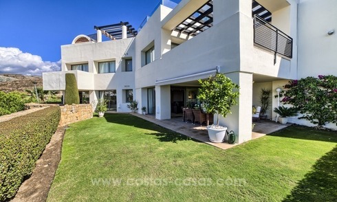 Modern luxury frontline golf ground floor apartment in a 5-star golf resort for sale in Benahavis - Marbella 