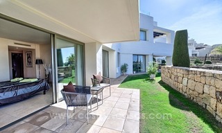 Modern luxury frontline golf ground floor apartment in a 5-star golf resort for sale in Benahavis - Marbella 1
