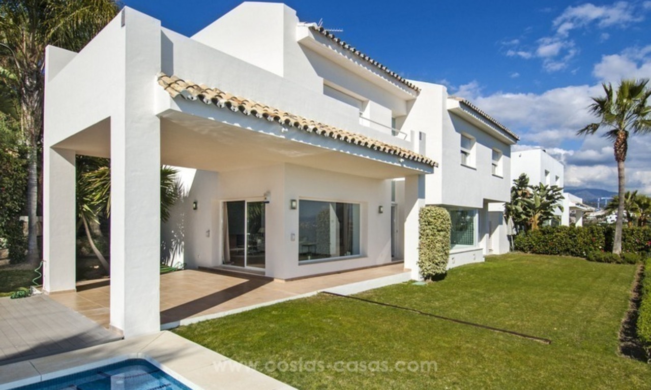 Front line golf, modern style villa for sale in Marbella - Benahavis with spectacular views to the sea, golf and mountains 10