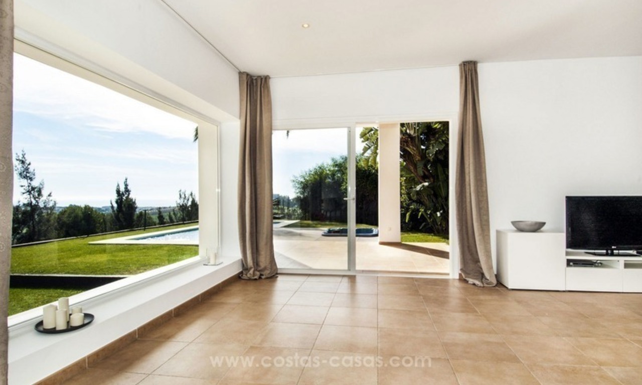 Front line golf, modern style villa for sale in Marbella - Benahavis with spectacular views to the sea, golf and mountains 15