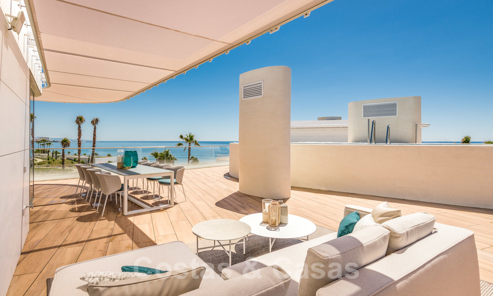 Spectacular modern luxury frontline beach apartments for sale in Estepona, Costa del Sol. Ready to move in. 27767