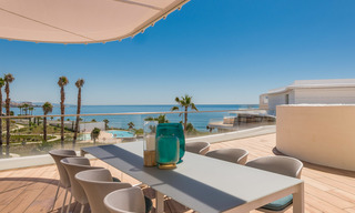 Spectacular modern luxury frontline beach apartments for sale in Estepona, Costa del Sol. Ready to move in. 27818 