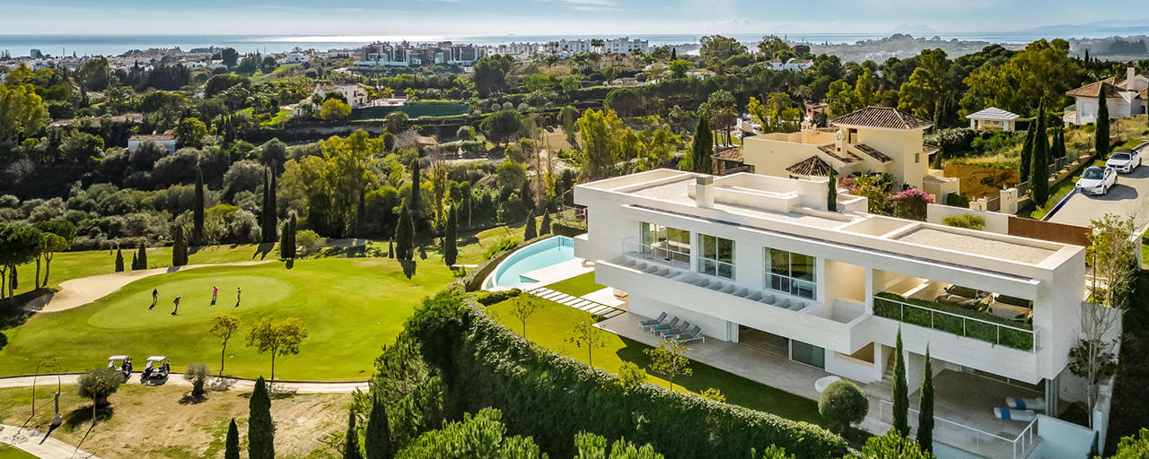 Frontline golf luxury villa in an elegant modern style with stunning golf and sea views for sale in Los Flamingos Golf resort in Marbella - Benahavis