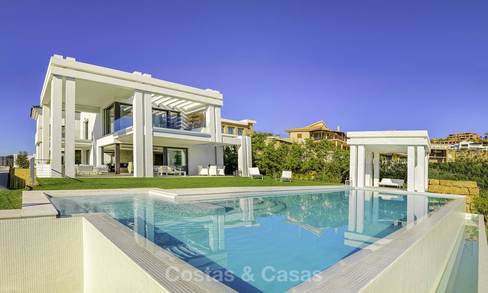 Elegant designer style villa for sale, frontline golf on a golf resort on the New Golden Mile, Marbella - Benahavis 13856