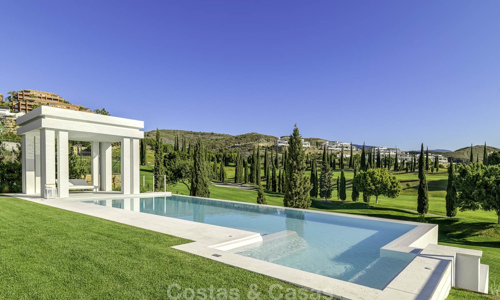 Elegant designer style villa for sale, frontline golf on a golf resort on the New Golden Mile, Marbella - Benahavis 13857