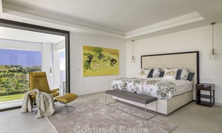 Elegant designer style villa for sale, frontline golf on a golf resort on the New Golden Mile, Marbella - Benahavis 13865 