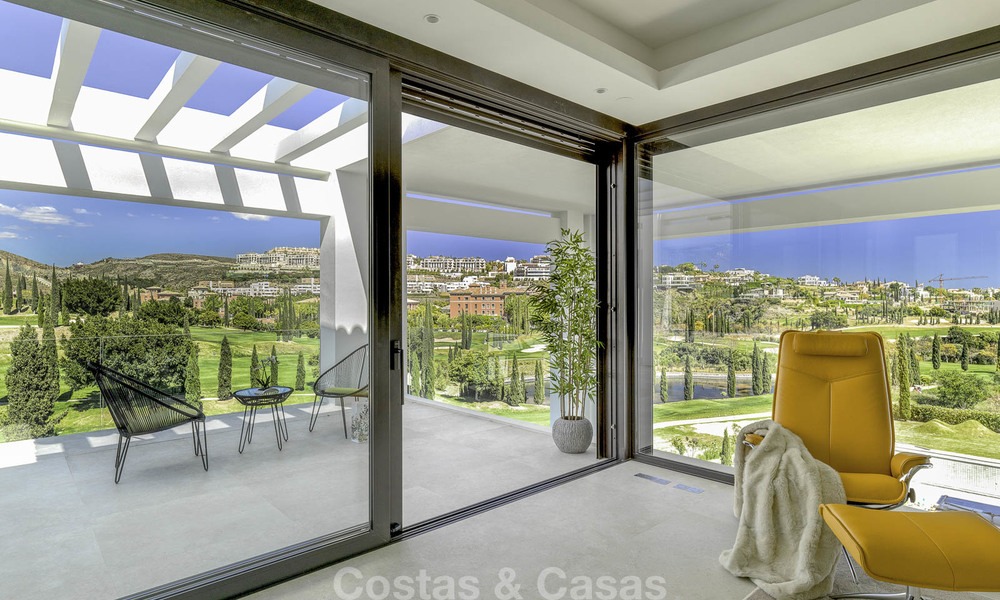 Elegant designer style villa for sale, frontline golf on a golf resort on the New Golden Mile, Marbella - Benahavis 13867