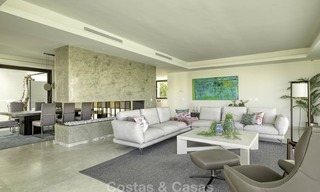 Elegant designer style villa for sale, frontline golf on a golf resort on the New Golden Mile, Marbella - Benahavis 13869 