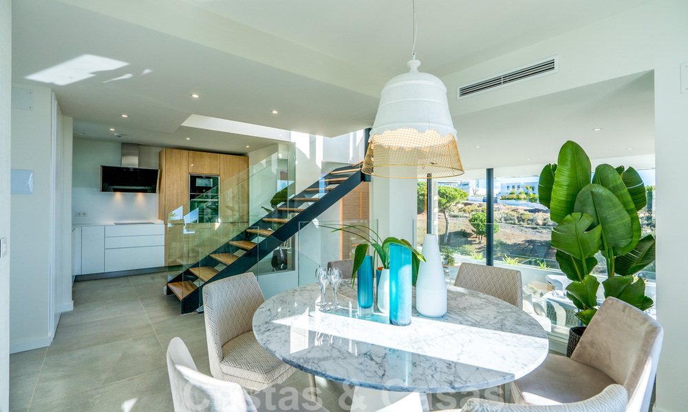 New modern and spacious first line golf townhouses for sale with breath taking views over Mediterranean and golf, Marbella East. Ready to move in. 33254