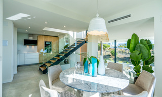 New modern and spacious first line golf townhouses for sale with breath taking views over Mediterranean and golf, Marbella East. Ready to move in. 33254 