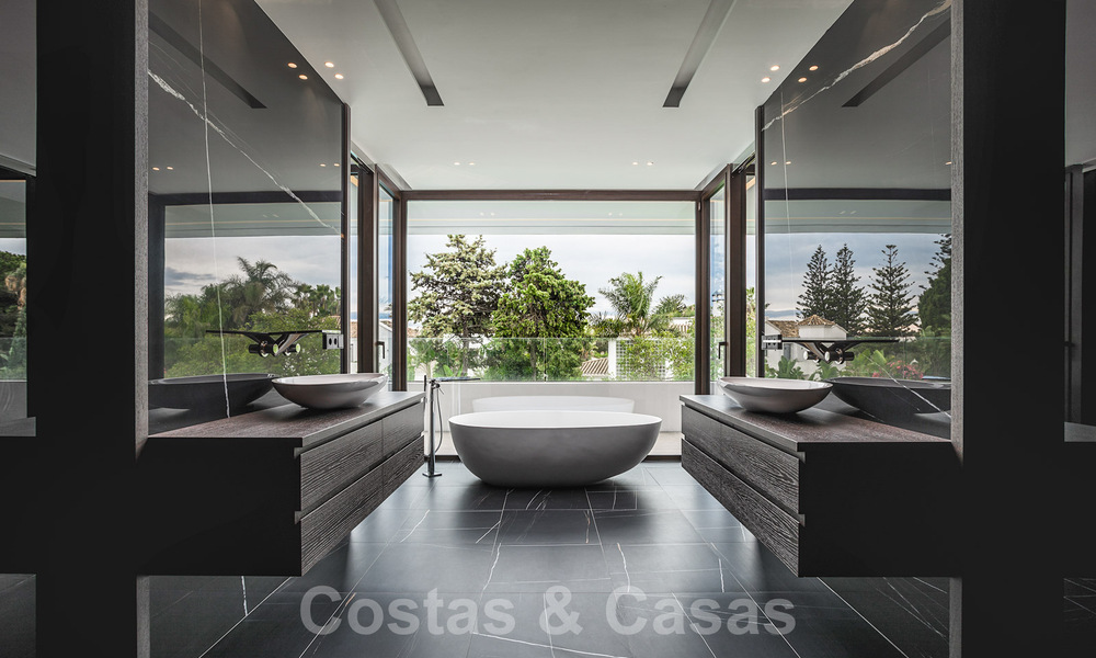 Brand new, beach side ultra-modern designer style villa for sale, Estepona East - Marbella. Ready to move in. 30716