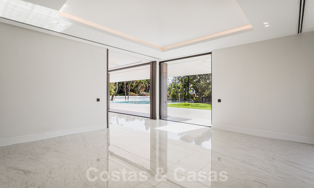 Brand new, beach side ultra-modern designer style villa for sale, Estepona East - Marbella. Ready to move in. 30745