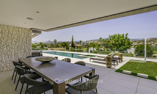 Impressive contemporary style luxury villa for sale in Nueva Andalucía, Marbella. Ready to move in and quality furnished. 15335 