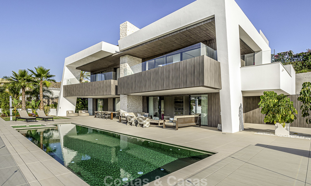 Impressive contemporary style luxury villa for sale in Nueva Andalucía, Marbella. Ready to move in and quality furnished. 15580