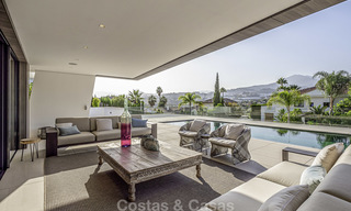 Impressive contemporary style luxury villa for sale in Nueva Andalucía, Marbella. Ready to move in and quality furnished. 15584 