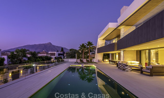 Impressive contemporary style luxury villa for sale in Nueva Andalucía, Marbella. Ready to move in and quality furnished. 15590 