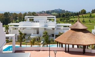 New, modern raised garden apartment with golf, mountain- and sea-views for sale in Benahavis - Marbella 5815 