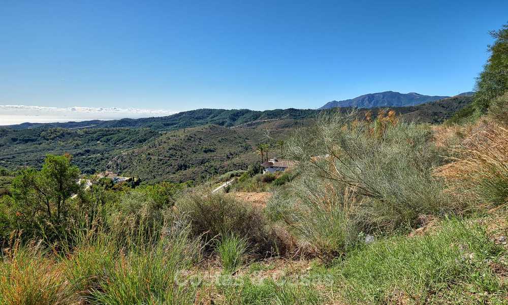 For sale: large building plot with panoramic sea and mountain views in a luxury estate in Benahavis, Marbella 7202
