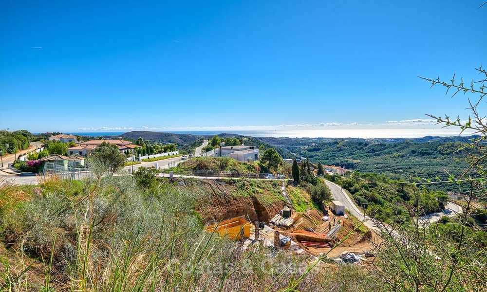 For sale: large building plot with panoramic sea and mountain views in a luxury estate in Benahavis, Marbella 7204
