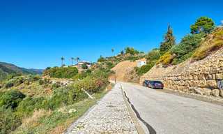 For sale: large building plot with panoramic sea and mountain views in a luxury estate in Benahavis, Marbella 7205 