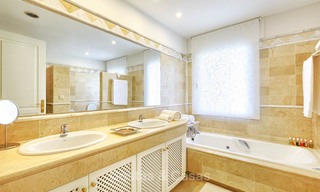 Spacious ground floor luxury apartment with sea views for sale in Elviria, Marbella East 7537 