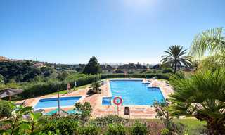Spacious ground floor luxury apartment with sea views for sale in Elviria, Marbella East 7551 