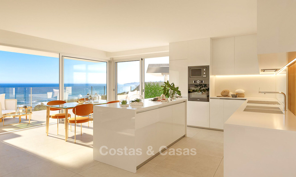 Stunning new contemporary-style townhouses with sea views for sale, in a prestigious resort - Mijas Costa, Costa del Sol 7619
