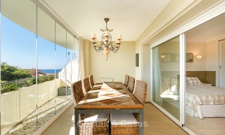 Very spacious 4 bedrooms beachside apartment with sea views for sale, in a prestigious urbanisation, East Marbella 9144 