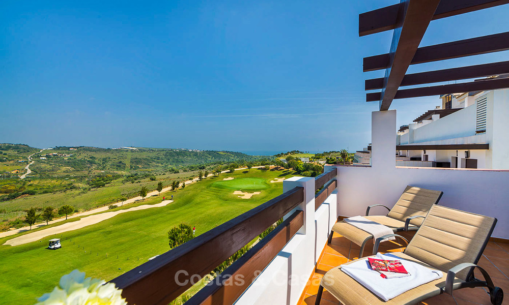 Frontline golf apartments for sale in 4-star gated holiday resort with golf-and sea views in Estepona, Costa del Sol 9903