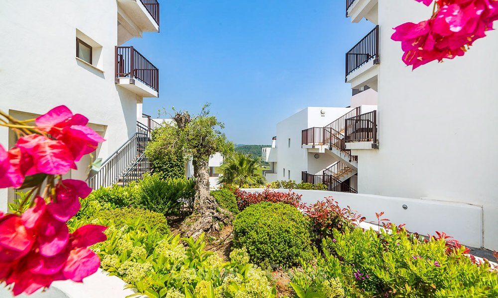 Frontline golf apartments for sale in 4-star gated holiday resort with golf-and sea views in Estepona, Costa del Sol 9904