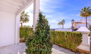 Spacious semi-detached house with magnificent sea views for sale, in a prestigious beach front complex - East Marbella 10052 