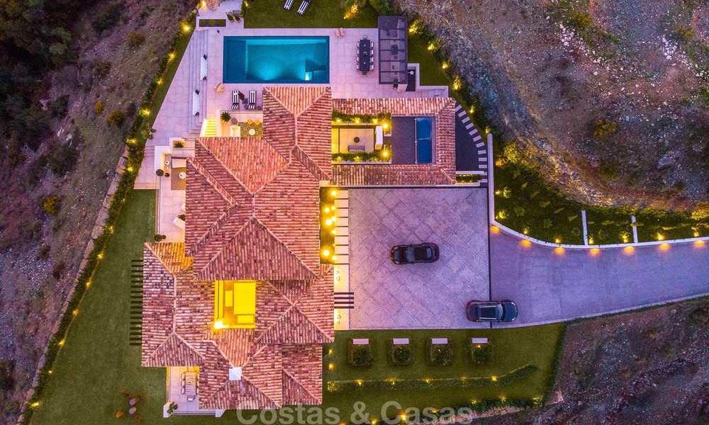 Sumptuous fully renovated villa with magnificent sea views for sale in El Madroñal, Benahavis - Marbella 10091